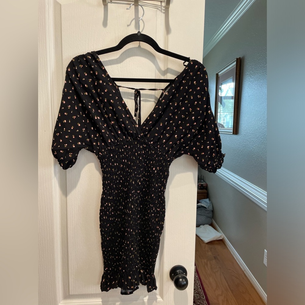 Very cute Forever 21 dress. With smocking. Black‎ with cute pink flowers. Small